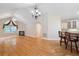 Open kitchen with bar-style seating featuring white cabinetry, granite countertops and stainless steel appliances at 5336 Stone Village Nw Cir # 2, Kennesaw, GA 30152