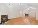 Spacious living room with a marble fireplace and a view into the kitchen, enhancing the open-concept design at 5336 Stone Village Nw Cir # 2, Kennesaw, GA 30152