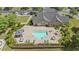 Aerial view of community pool, tables, chairs, and lounge furniture at 5336 Stone Village Nw Cir # 2, Kennesaw, GA 30152