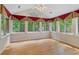 Sunroom bathed in natural light with views of the surrounding greenery, creating a peaceful retreat at 5336 Stone Village Nw Cir # 2, Kennesaw, GA 30152