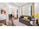Relaxing living room with a comfortable sofa and lots of natural light at 121 Royal Sunset Dr, Dallas, GA 30157