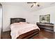 Spacious main bedroom with a decorative dresser and large bed at 121 Royal Sunset Dr, Dallas, GA 30157