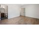 Bedroom with hardwood floors, a ceiling fan, and featuring an ensuite bathroom and closet space at 1995 Mcafee Rd, Decatur, GA 30032