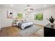 Bright and airy bedroom with hardwood floors, lots of windows, and neutral decor for a calming space at 1995 Mcafee Rd, Decatur, GA 30032