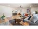 Spacious living room with hardwood floors flowing into an open kitchen and dining area at 1995 Mcafee Rd, Decatur, GA 30032