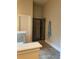 Modern tiled shower in a well-maintained bathroom at 200 Birchwood Dr, Loganville, GA 30052