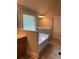 Soaking tub with window in neutral bathroom at 200 Birchwood Dr, Loganville, GA 30052