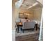 Formal dining room with coffered ceiling and elegant lighting at 200 Birchwood Dr, Loganville, GA 30052