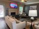 Well-decorated living room with a fireplace and stylish furnishings at 200 Birchwood Dr, Loganville, GA 30052