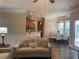 Open-concept living space with a comfortable sofa and dining area at 200 Birchwood Dr, Loganville, GA 30052