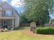 View of a two story home featuring a manicured lawn at 200 Birchwood Dr, Loganville, GA 30052
