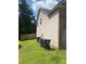 View of the side of a two-story house at 200 Birchwood Dr, Loganville, GA 30052