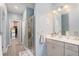 Stylish bathroom featuring a glass-enclosed shower, and a spacious vanity at 2140 Ravencliff Dr, Austell, GA 30168