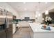 Bright modern kitchen with white cabinets, stainless steel appliances, and center island at 2140 Ravencliff Dr, Austell, GA 30168