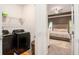 Modern laundry room with washer and dryer conveniently located near the Primary bedroom at 2140 Ravencliff Dr, Austell, GA 30168