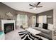 Inviting living room with a fireplace, modern decor, and a comfortable seating area at 2140 Ravencliff Dr, Austell, GA 30168