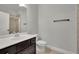 Bathroom featuring a single vanity, toilet, and walk-in shower at 2740 Longacre Park Way, Lawrenceville, GA 30044