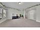 Bonus room featuring green hanging vines and a large window with natural light at 2740 Longacre Park Way, Lawrenceville, GA 30044