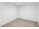 Cozy carpeted basement room with white walls, providing a blank canvas for customization at 1097 Soaring Way, Marietta, GA 30062