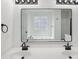 Bathroom featuring double sinks, black hardware, and large mirror at 1097 Soaring Way, Marietta, GA 30062