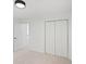 Clean bedroom boasts carpeting, modern lighting, and large closet at 1097 Soaring Way, Marietta, GA 30062