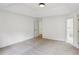 Spacious carpeted bedroom with natural light and doorway to hall at 1097 Soaring Way, Marietta, GA 30062