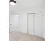 Clean bedroom boasts carpeting, modern lighting, and closet at 1097 Soaring Way, Marietta, GA 30062