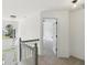 Bright and airy foyer with a modern chandelier, staircase, and a view through the large window at 1097 Soaring Way, Marietta, GA 30062