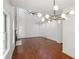 Bright living room with high ceilings, hardwood floors, and a modern chandelier at 1097 Soaring Way, Marietta, GA 30062