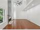 Bright living room with high ceilings, hardwood floors, and a cozy fireplace at 1097 Soaring Way, Marietta, GA 30062