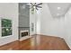 Bright living room with high ceilings, hardwood floors, and a cozy fireplace at 1097 Soaring Way, Marietta, GA 30062