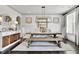 Stylish dining room showcasing a large wooden table, bench seating, and modern decor at 3330 Riverwalk Way, Cumming, GA 30040