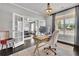 Bright home office with french doors, a comfortable workspace, and natural light at 3330 Riverwalk Way, Cumming, GA 30040