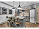Kitchenette with gray cabinets, butcher block countertop, and retro style refrigerator at 3330 Riverwalk Way, Cumming, GA 30040