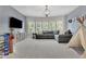 Spacious recreation room offers comfortable seating and entertainment space at 3330 Riverwalk Way, Cumming, GA 30040
