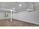 Spacious finished basement with wood-look floors and ample natural light at 4999 Willow Creek Dr, Woodstock, GA 30188