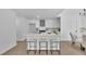 Open concept kitchen with a large island and seating for three at 4999 Willow Creek Dr, Woodstock, GA 30188
