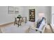 Serene home office with modern desk, neutral color palette, stylish furnishings, and natural light at 4999 Willow Creek Dr, Woodstock, GA 30188