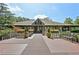 Beautiful clubhouse featuring colorful flower boxes and welcoming entryway at 1027 Riverbend Club Se Dr, Atlanta, GA 30339