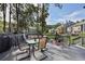 Spacious deck perfect for entertaining with views of a wooded community at 1027 Riverbend Club Se Dr, Atlanta, GA 30339