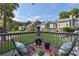 Relaxing deck featuring a charming outdoor fireplace, ideal for cozy evenings at 1027 Riverbend Club Se Dr, Atlanta, GA 30339