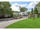 Community entrance with gated entry, manicured lawns, and clear signage at 1027 Riverbend Club Se Dr, Atlanta, GA 30339