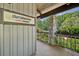 Inviting entrance with stone accents and lush greenery with Chattahoochee Coffee Company sign at 1027 Riverbend Club Se Dr, Atlanta, GA 30339