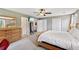 Cozy main bedroom with ceiling fan, ample closet space, and neutral tones at 1027 Riverbend Club Se Dr, Atlanta, GA 30339