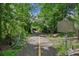Scenic paved pathway through lush greenery with historical marker on the side at 1027 Riverbend Club Se Dr, Atlanta, GA 30339
