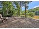 A picturesque picnic area with a grill provides a scenic spot for outdoor dining and relaxation at 1027 Riverbend Club Se Dr, Atlanta, GA 30339