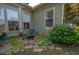 Picturesque backyard with a charming water feature, vibrant foliage, and serene garden views at 105 Whippoorwill Way, Fayetteville, GA 30215