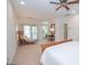 Spacious bedroom with an ensuite bathroom and ceiling fan, perfect for relaxing at 105 Whippoorwill Way, Fayetteville, GA 30215