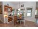 Dining area featuring tile flooring and natural light from multiple windows at 105 Whippoorwill Way, Fayetteville, GA 30215