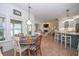 Open dining area with access to the kitchen and living room, features tile floors at 105 Whippoorwill Way, Fayetteville, GA 30215